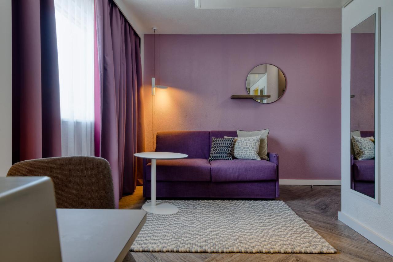 Suite mit 2 Schlafzimmern mit Doppelbett und Sofa
