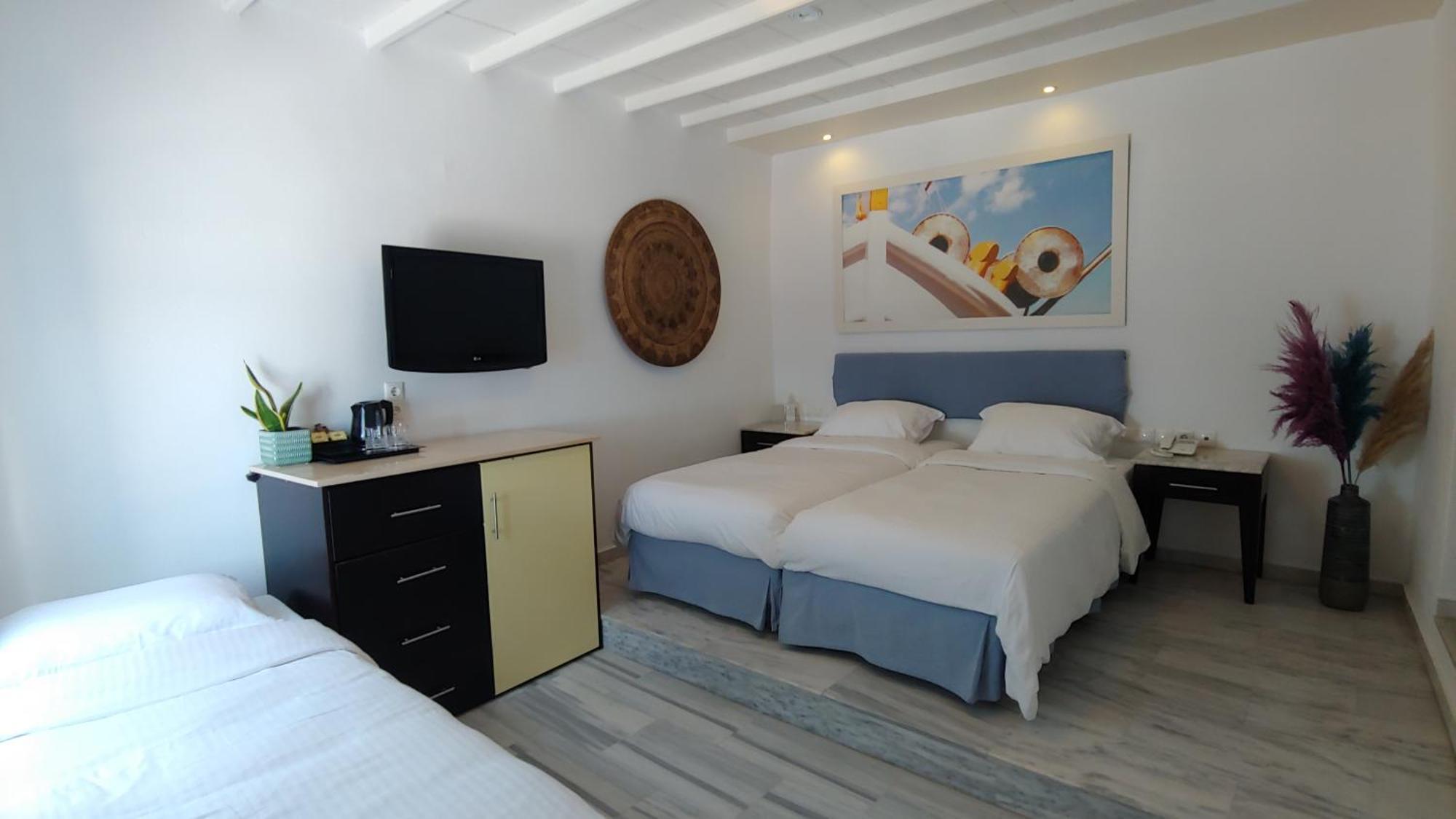 Superior Triple Room with Sea View,1362431993:JPEG