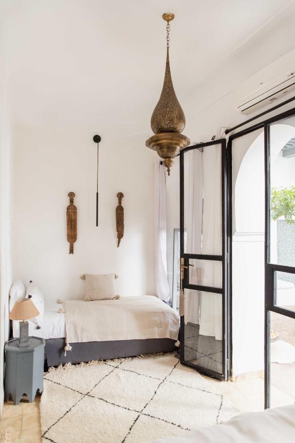 Chambre Double Deluxe (2 Adultes + 1 Enfant)