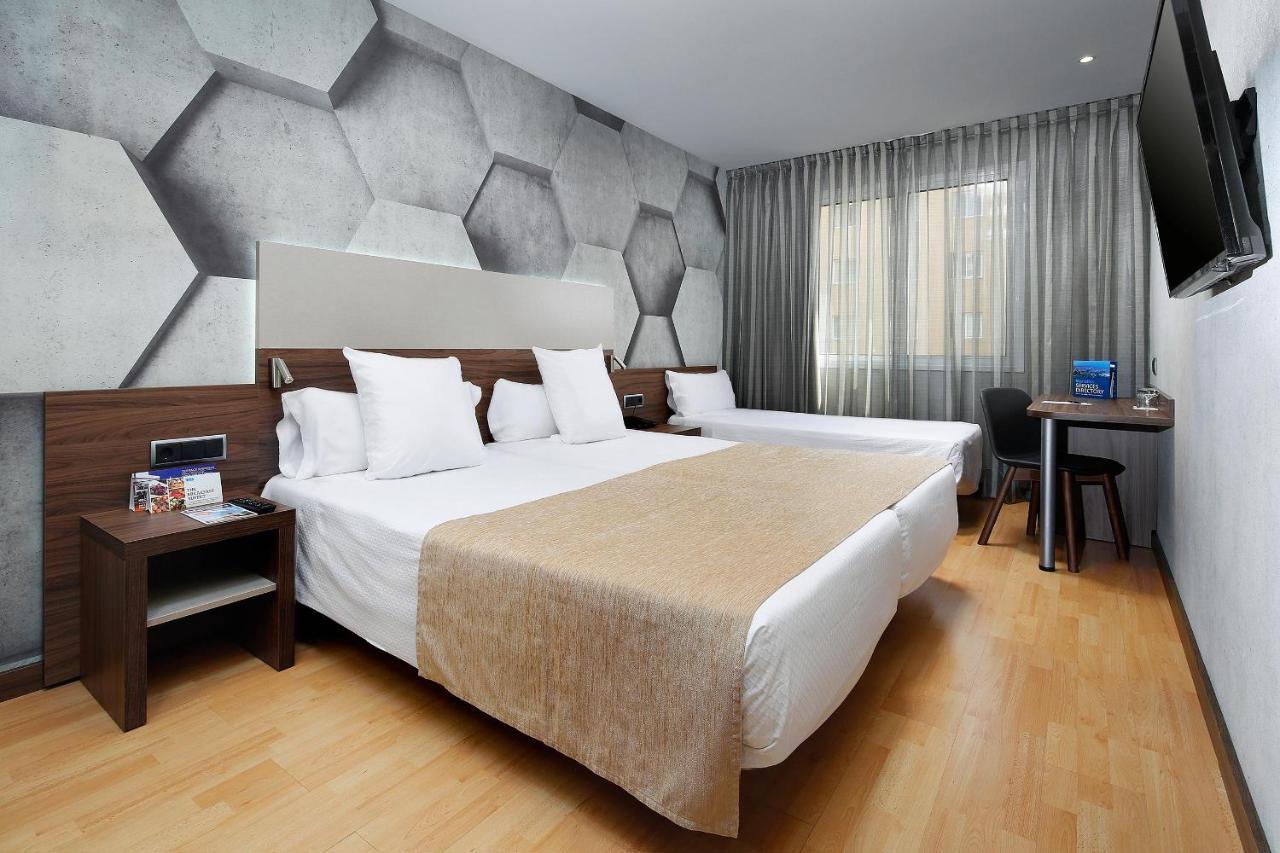 Chambre Lits Jumeaux avec Lit d'Appoint (3 adultes)