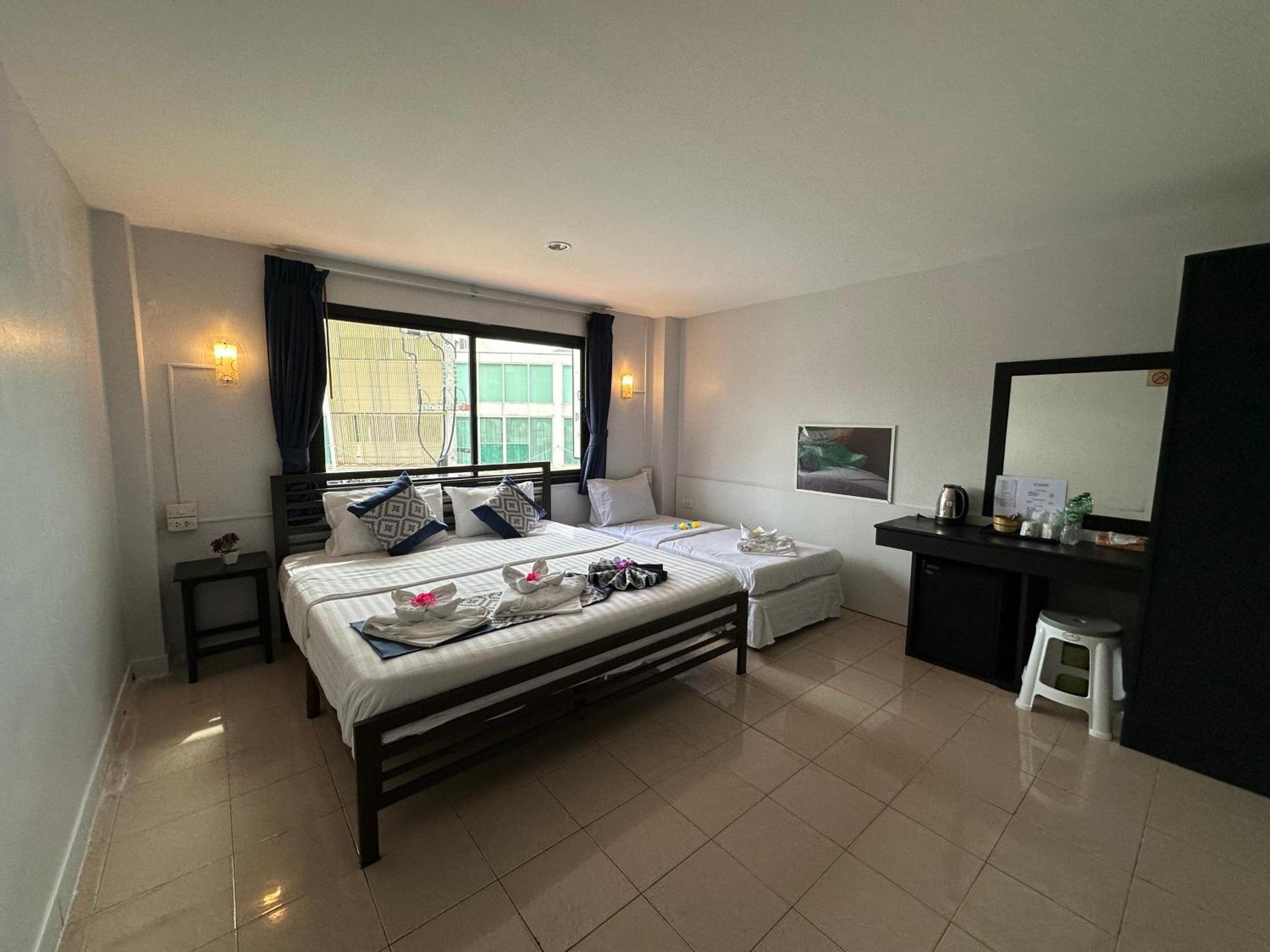 Chambre Triple avec Salle de Bains Privative