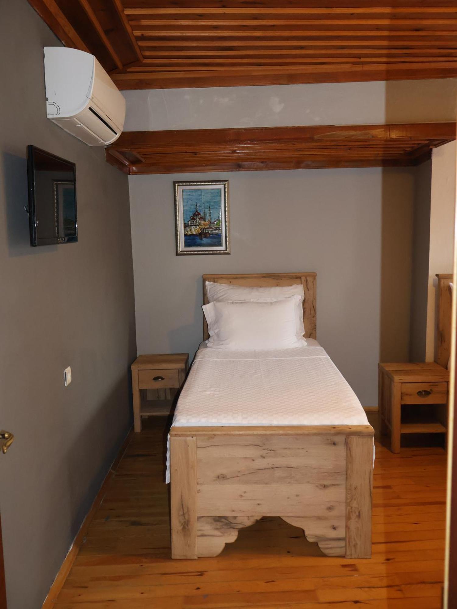 Deluxe Dreibettzimmer