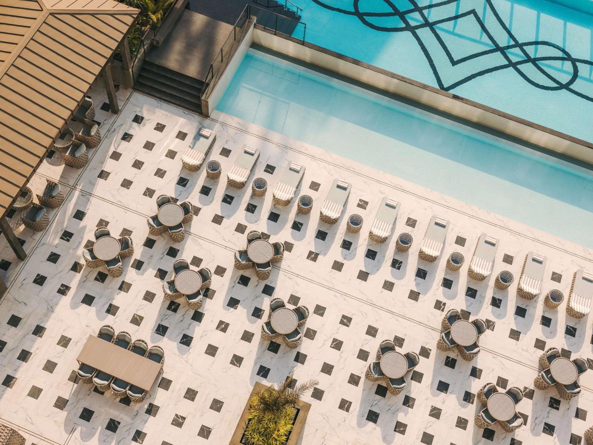 Fairmont Twin Room with Pool View and Complimentary Airport Transfers (T1 & T2) , Soft Mini Bar , Daily 4 Piece Laundry(Non Cumulative) and 15% discount on dining (barring IRD & tobacco), Book a 60-Min Spa Session & 50% Off on Cryotherapy*