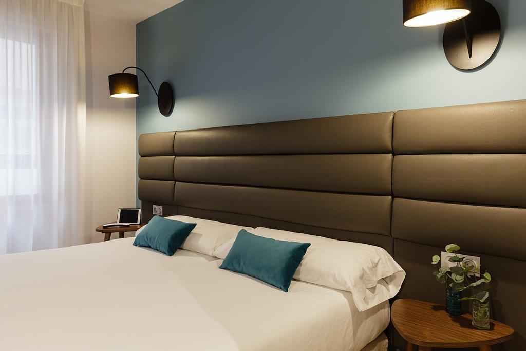 Chambre Double avec Lit d'Appoint (3 Adultes)