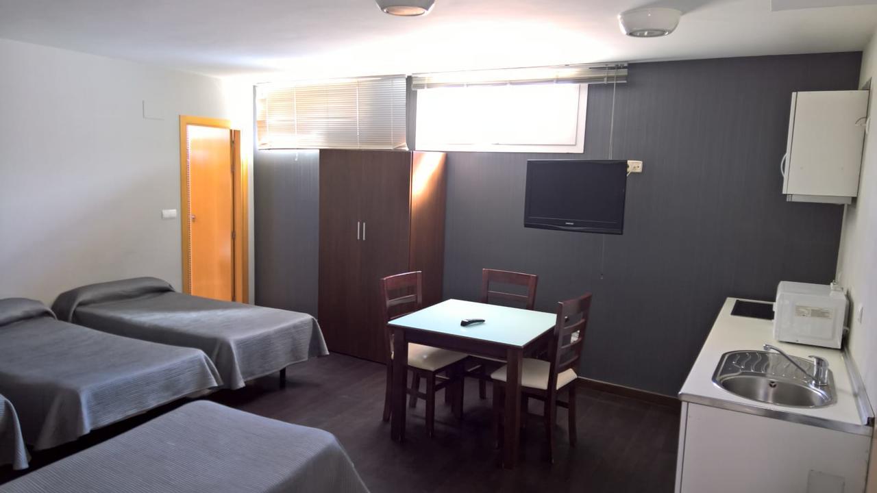 Apartamento semibajo - 4 camas individuales