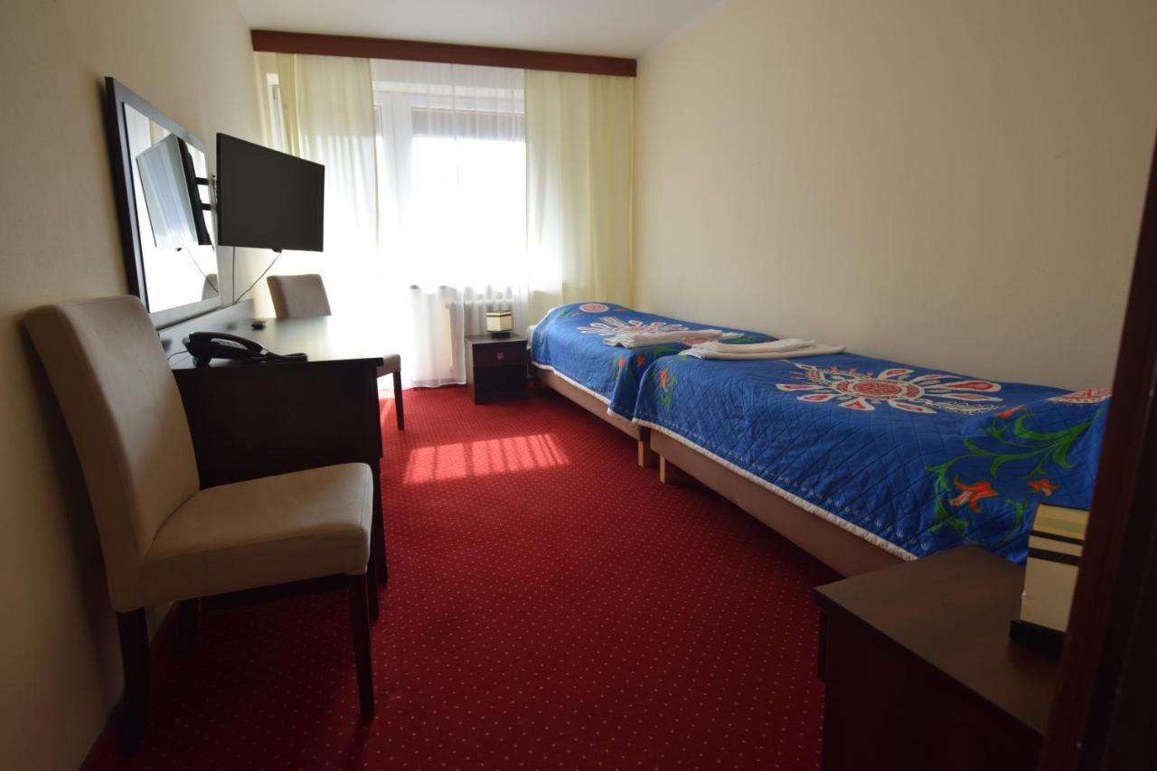 Quarto com 2 Camas de Solteiro e Varanda