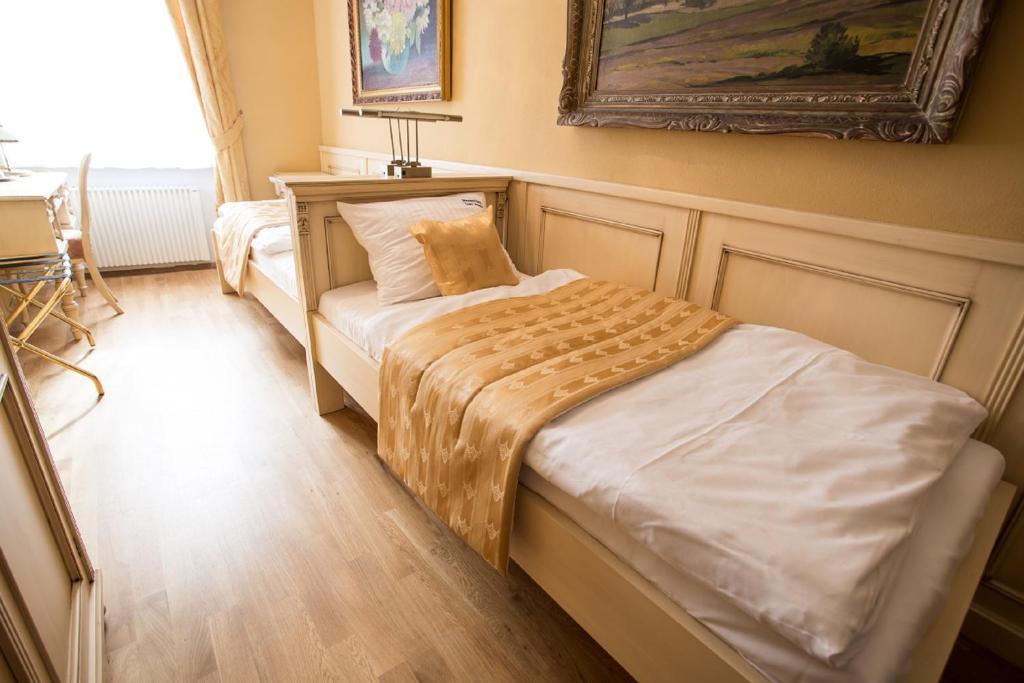 Tweepersoonskamer met 2 Aparte Bedden