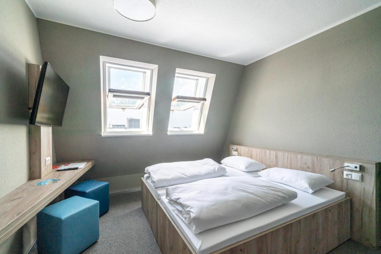 Doppel- oder Zweibettzimmer